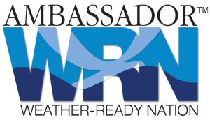The image displays the logo of "Ambassador Weather-Ready Nation." The text "WRN" is prominently featured in large blue letters with a stylized wave running through it. Above "WRN" is the word "Ambassador," and below it reads "Weather-Ready Nation.