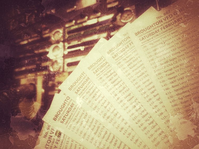 Seven vintage-style tickets labeled "Broughton vs Led Group," dated Saturday, February 5, are fanned out in the foreground, with a blurred, sepia background suggesting an old printing press.